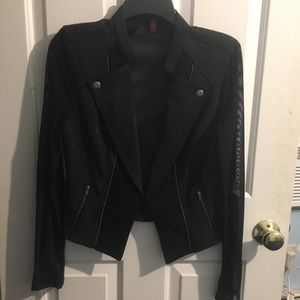 Sheer sleeves sparkle black jacket.